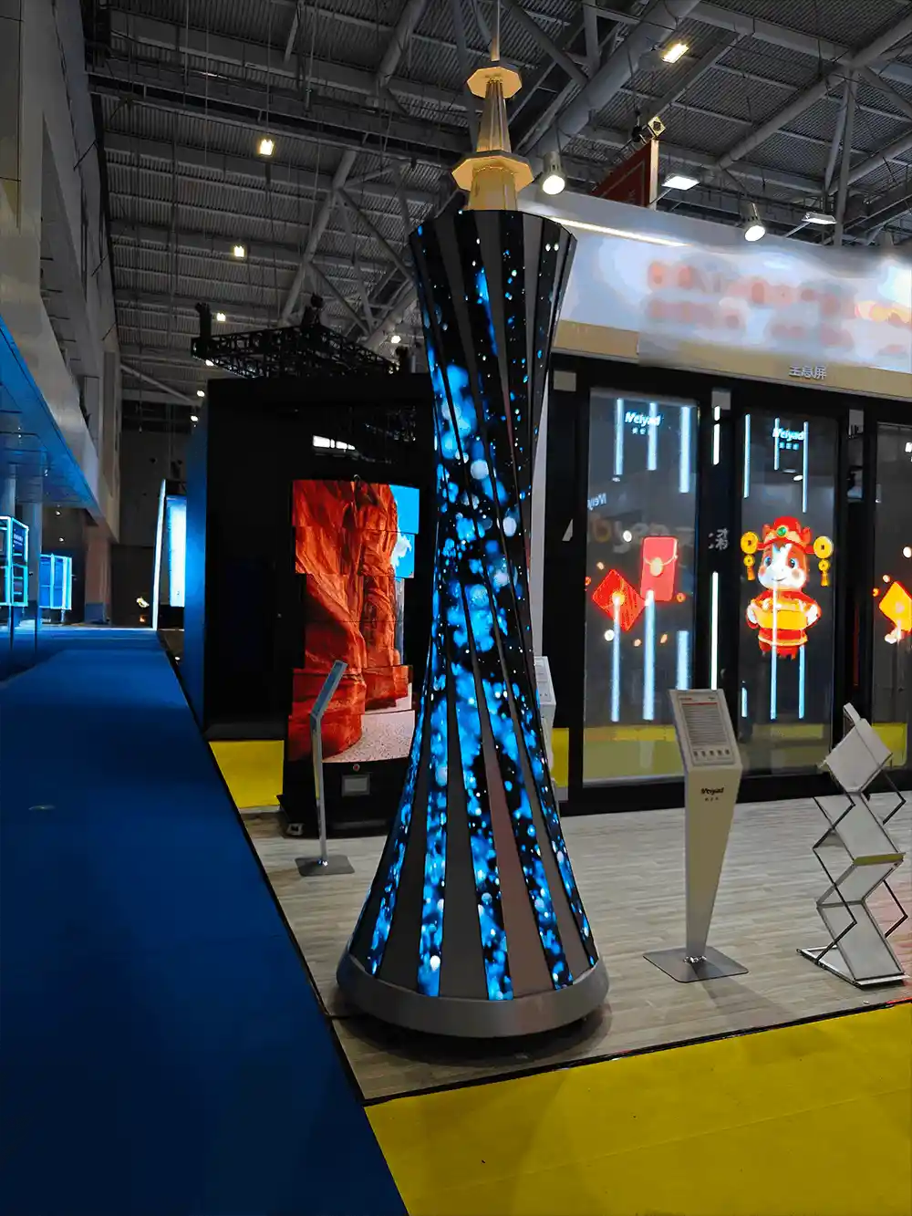 Creative 360-degree twisted LED tower screen at ISLE 2026 exhibition